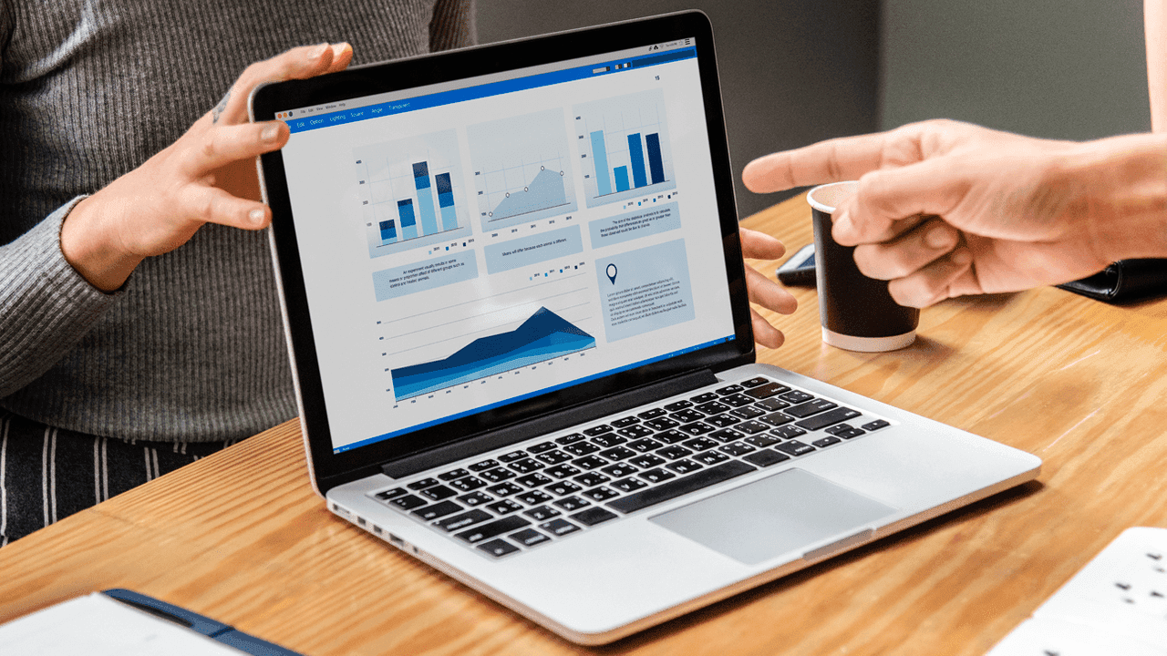 Man pointing at a laptop